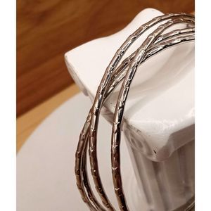 Vintage Set of 4 Stackable Hammered texture Silvertone Bangles Bracelets